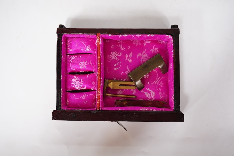 A Chinese brass mounted jewellery cabinet, decorated with enamel plaques. 21cm high. Condition - generally good